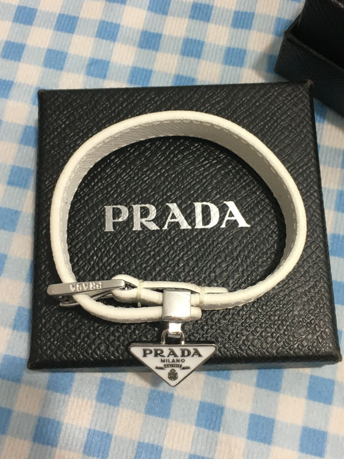 PRADA プラダ サフィアーノレザー ブレスレット ユニセックス 男女兼用 三角ロゴ ホワイト シルバー金具