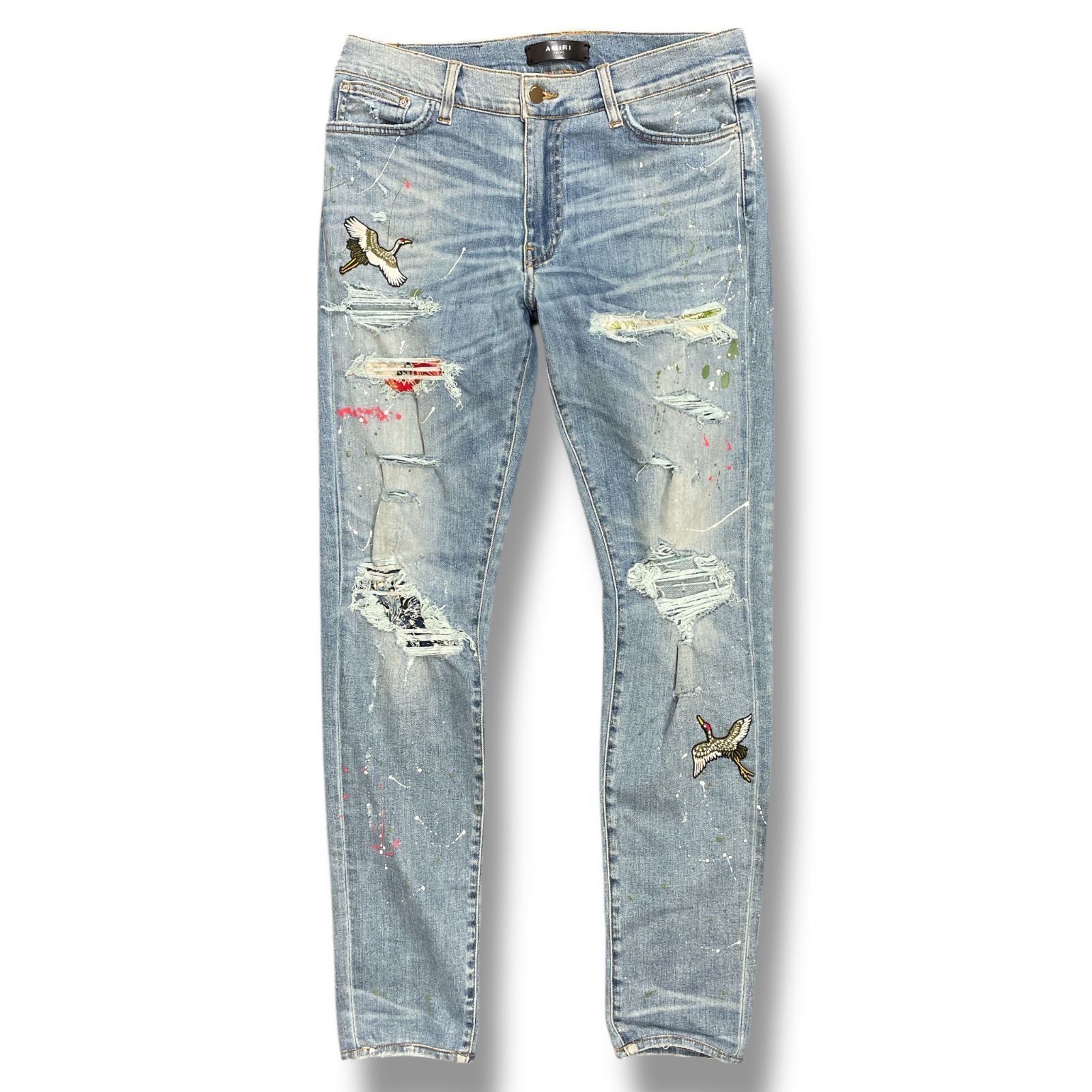 AMIRI インディゴ ブロークン ペインター トラック ジーンズ AMIRI ペイント加工 鶴ワッペン クラッシュデニムパンツ