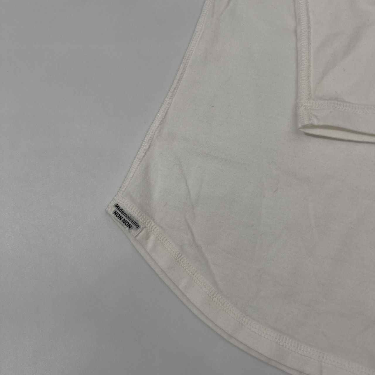 Mademoiselle NON NON マドモアゼルノンノン タグ付き フラッグ刺繍 七