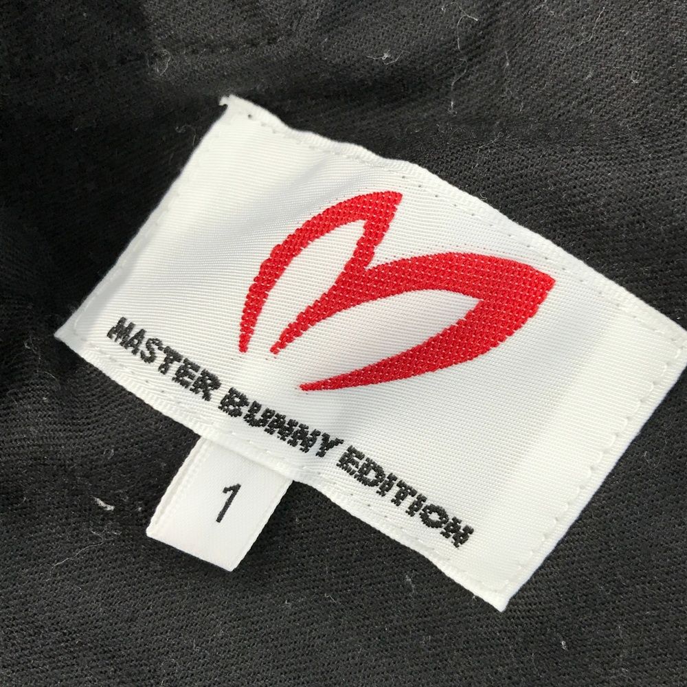 サイズ：1 MASTER BUNNY EDITION マスターバニーエディション  ロングパンツ ロゴ総柄 ブラック系 [240101470840] ゴルフウェア レディース ストスト サイズ：1 MASTER BUNNY EDITION マスターバニーエディション