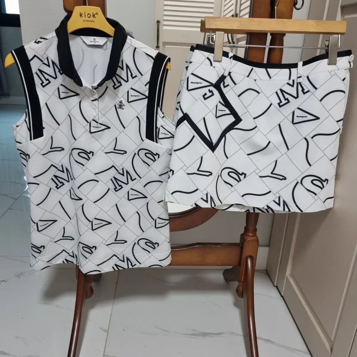 MUNSINGWEAR マンシングウェア 女性用ゴルフスーツ 55 バン 66