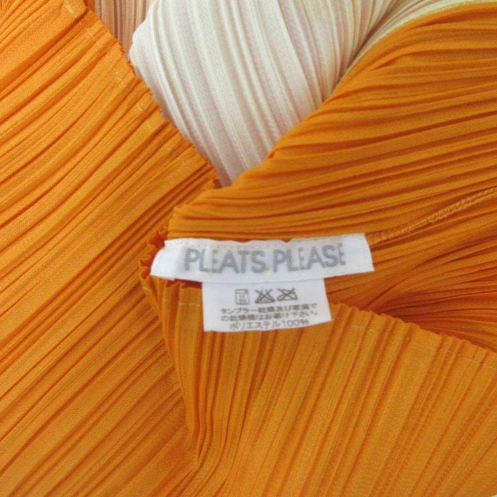 PLEATS PLEASE