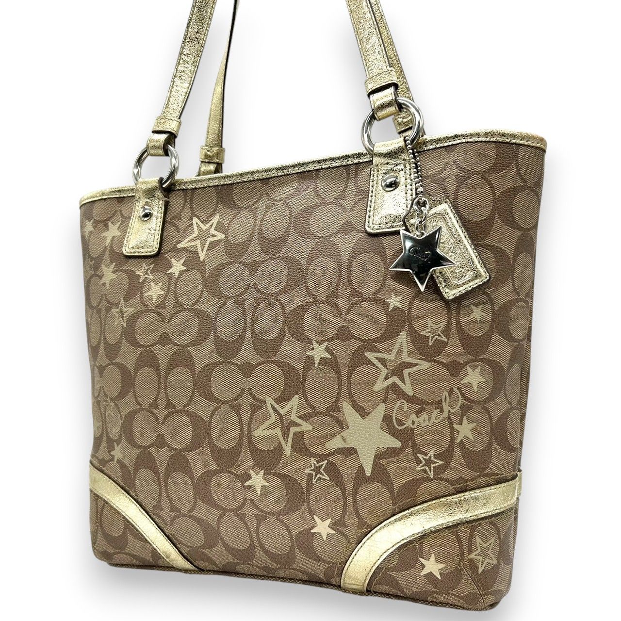 ♥級 COACH コーチ トートバッグ F18853 シグネチャー スター 星柄 PVC レザー ブラウン ゴールド レディース A4収納可 肩掛け チャーム付 通勤 通学 エレガント キュート 大容量 s49