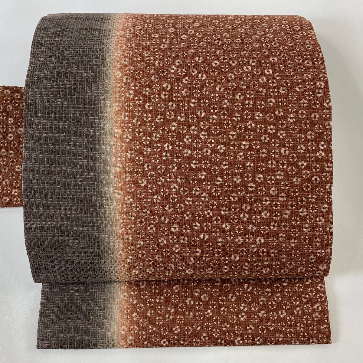 名古屋帯 美品 秀品 小花 幾何学模様 箔 ぼかし 赤茶 正絹