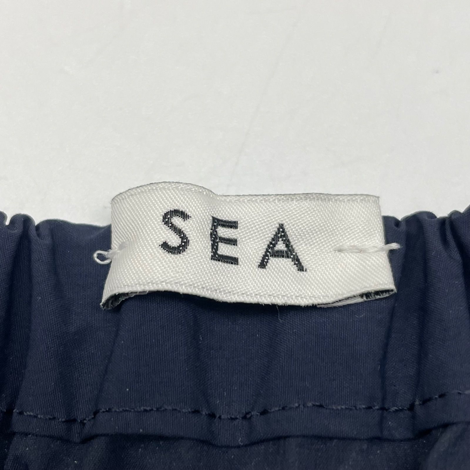 SEA TYPEWRITER DRAPE SKIRT ネイビー SEA TYPEWRITER DRAPE SKIRT