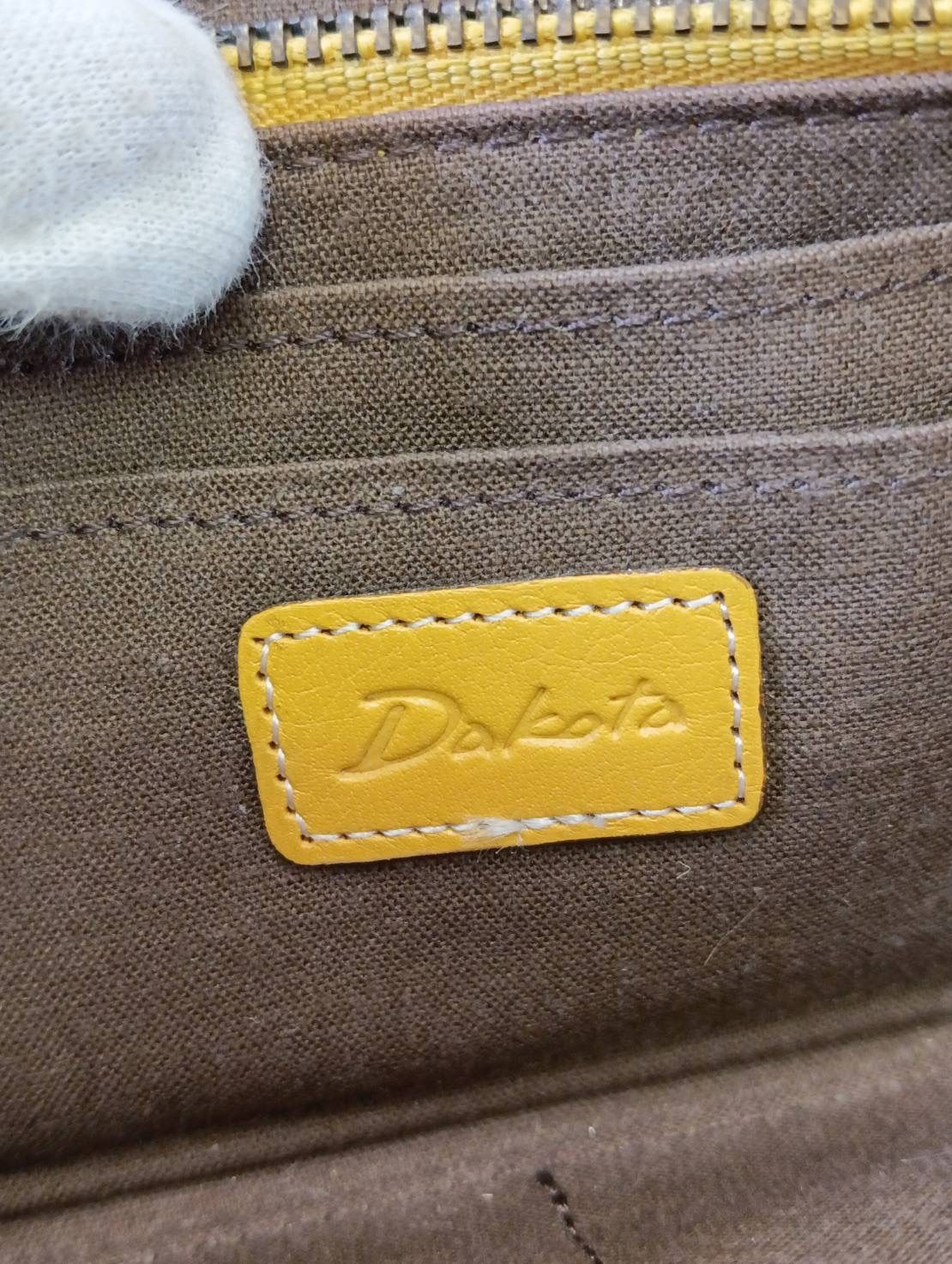 【未使用✨タグ付き】Dakota ダコタ デイジー がま口 長財布　イエロー 未使用✨タグ付き】Dakota ダコタ デイジー がま口 長財布 イエロー