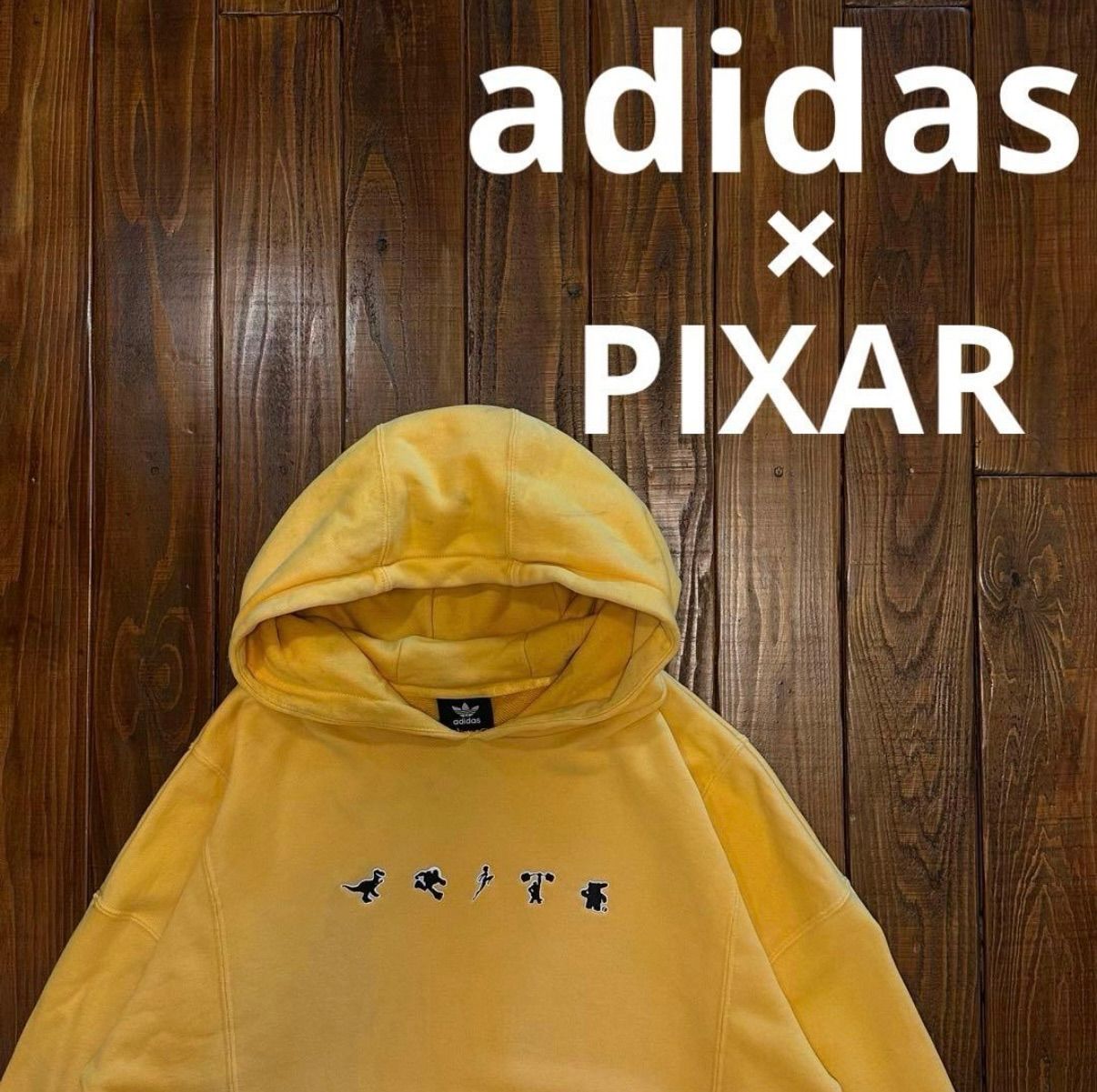adidas×PIXAR】コラボ限定パーカー フーディ イエロー - メルカリ