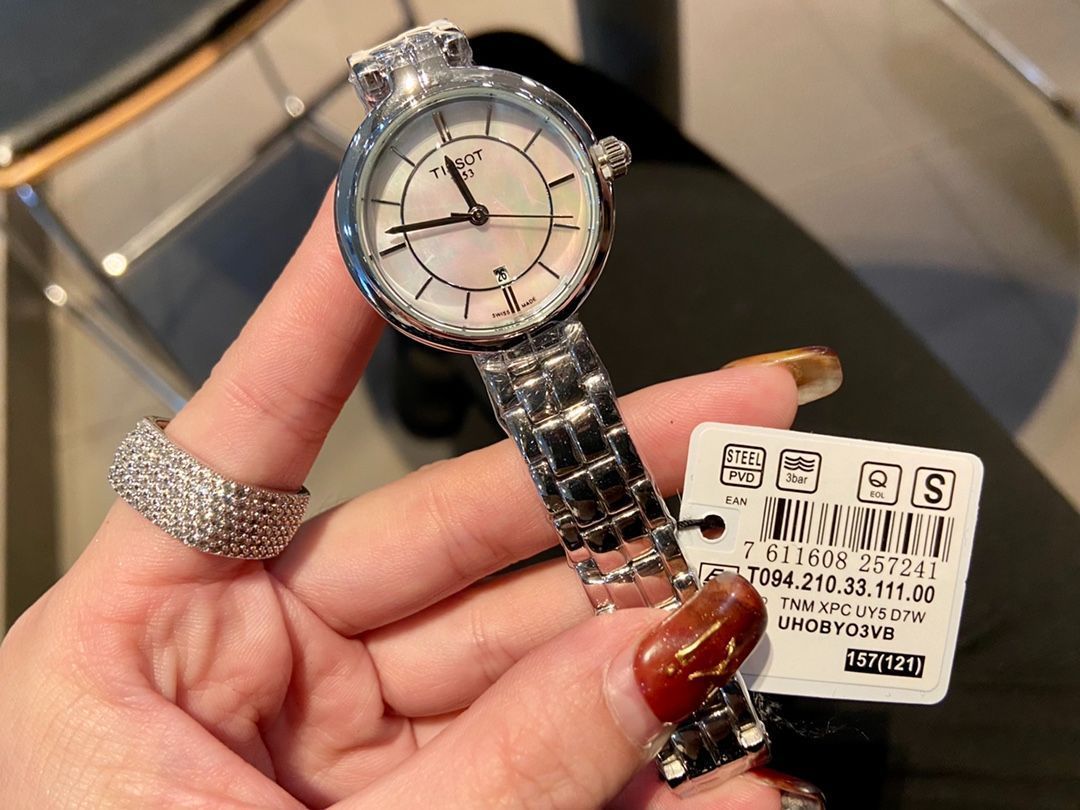 稼動/未使用級】TISSOT フラミンゴ シェル文字盤 レディース 腕時計