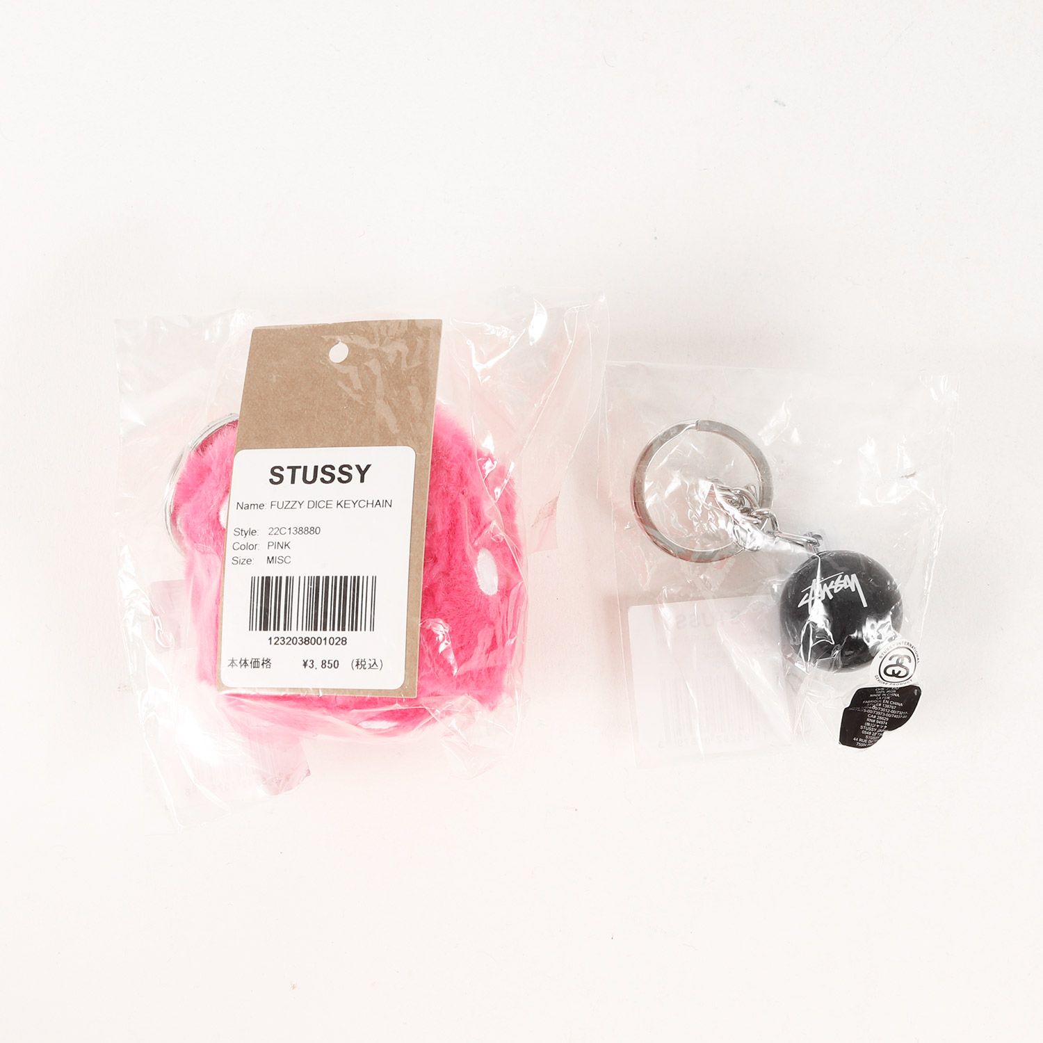 STUSSY FUZZY DICE KEYCHAIN ピンク Stussy Fuzzy Dice Keychain Pink