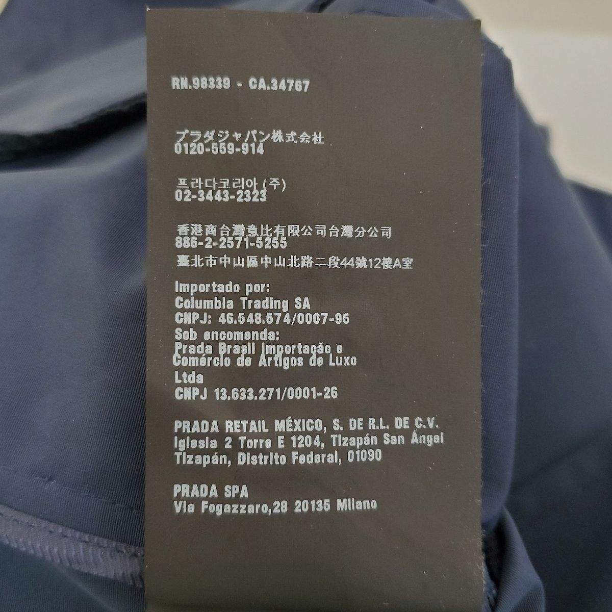 PRADA(プラダ) コート サイズ38 S レディース美品 - ネイビー 七分袖/春/秋