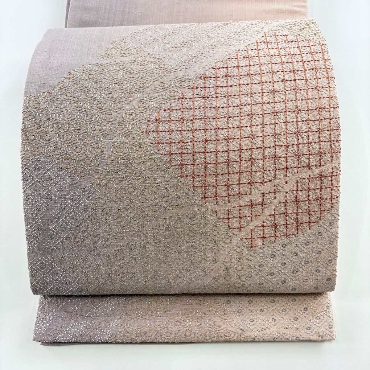 袋帯 美品 逸品 紬地 七宝 青海波 刺し子刺繍 薄ピンク お太鼓柄