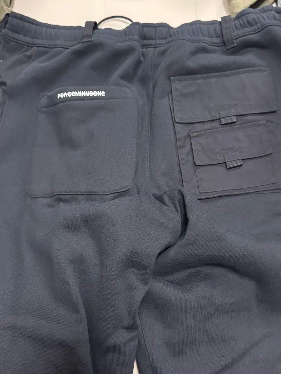  M NIKE ピースマイナスワン ワイド パンツ ジョガーパンツ スウェットパンツ パンツ