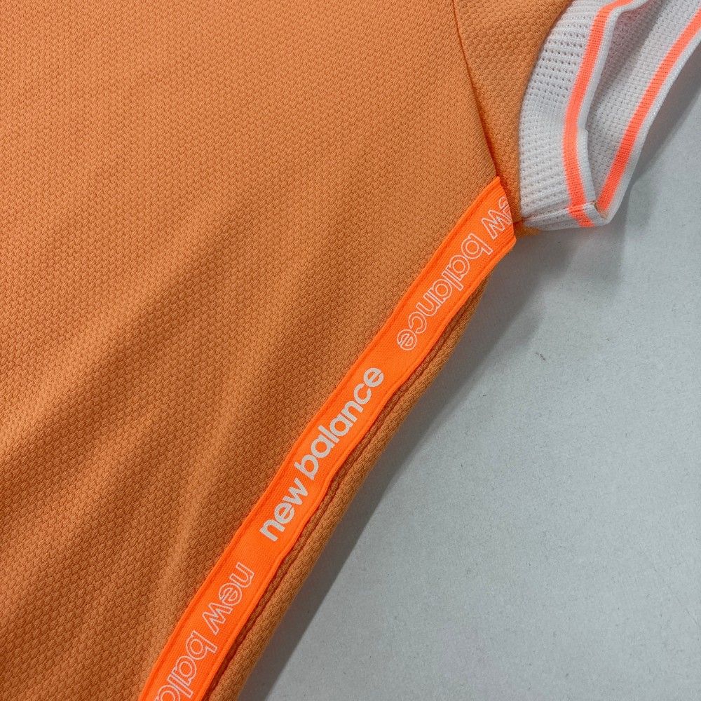 サイズ：2 NEW BALANCE GOLF ニューバランス 2022年モデル ハイネック 半袖Tシャツ サイドロゴ オレンジ系 [240101281844] ゴルフウェア レディース ストスト サイズ：2 NEW BALANCE GOLF ニューバランス 2022年モデル