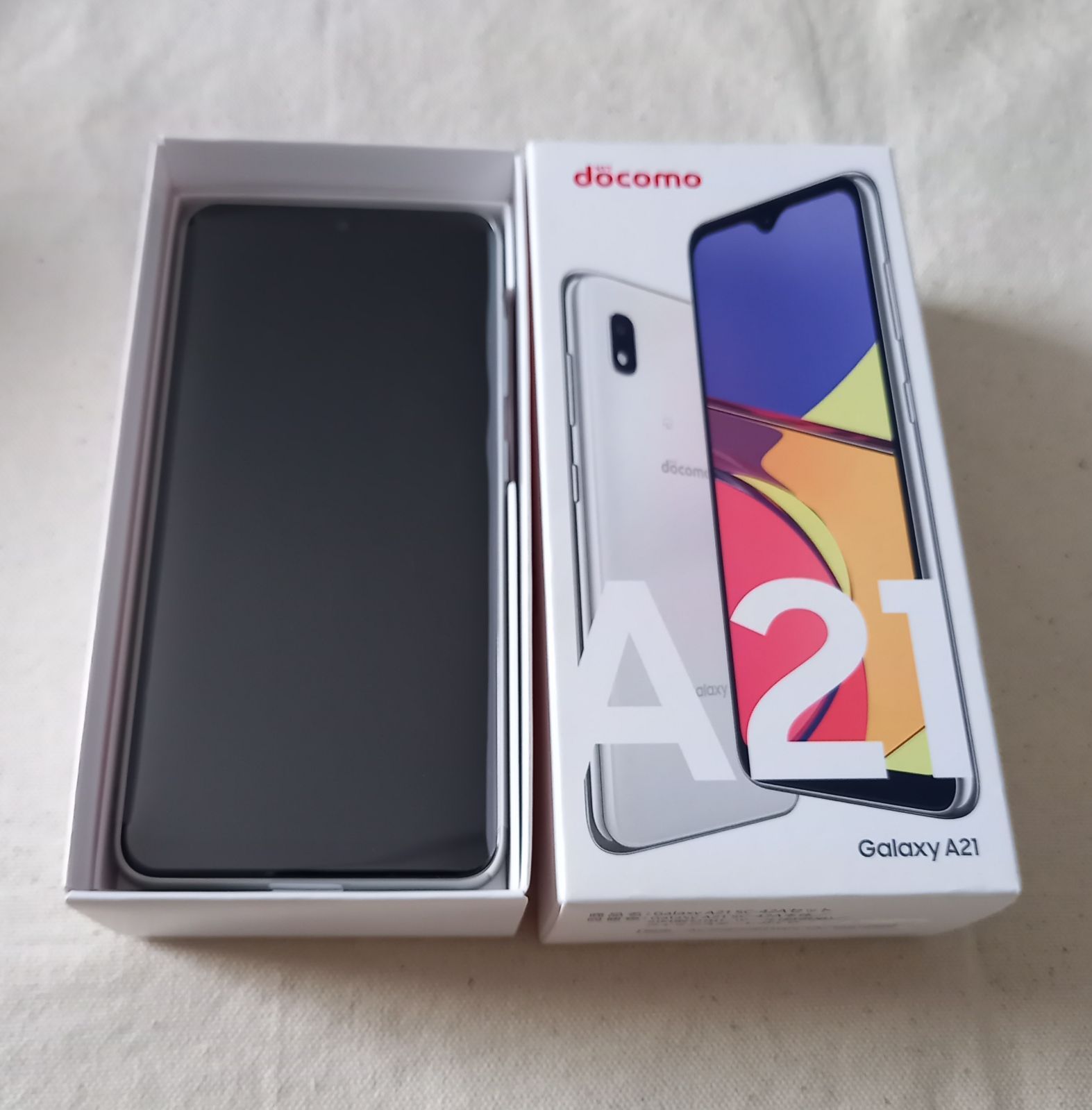 未使用品】docomo Galaxy A21 SC-42A White - メルカリ