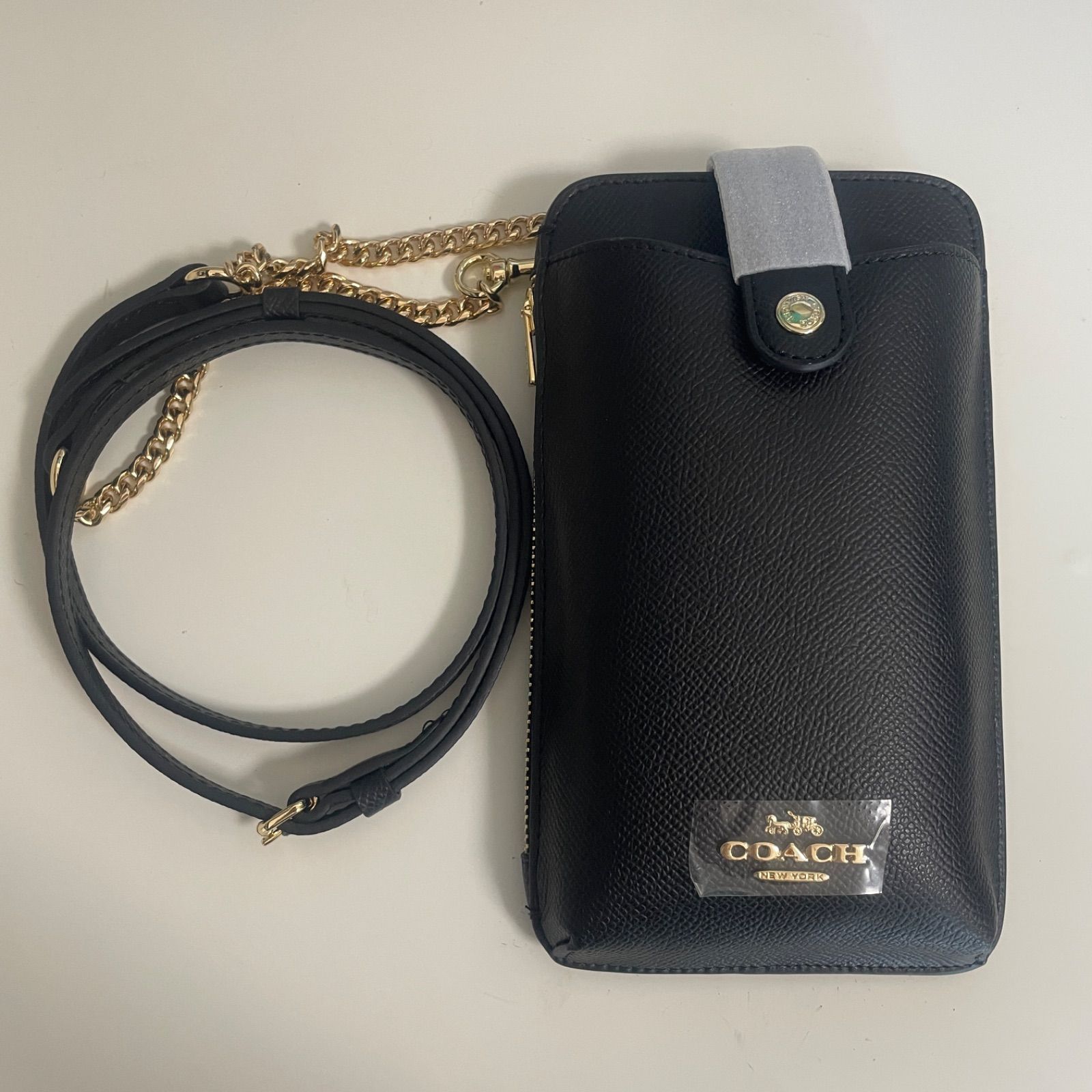 新品・未使用】COACH スマホショルダー ブラック シグネチャー - メルカリ