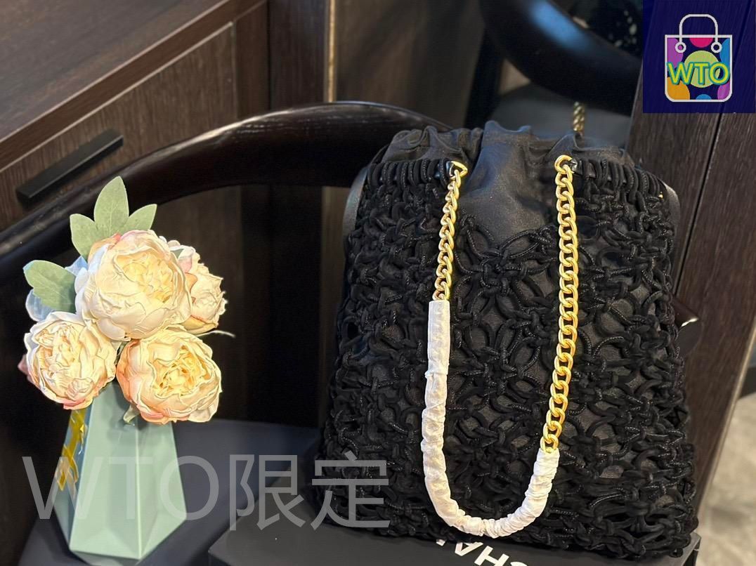 CHANELシャネルのブラック編み込みビーチバッグ｜