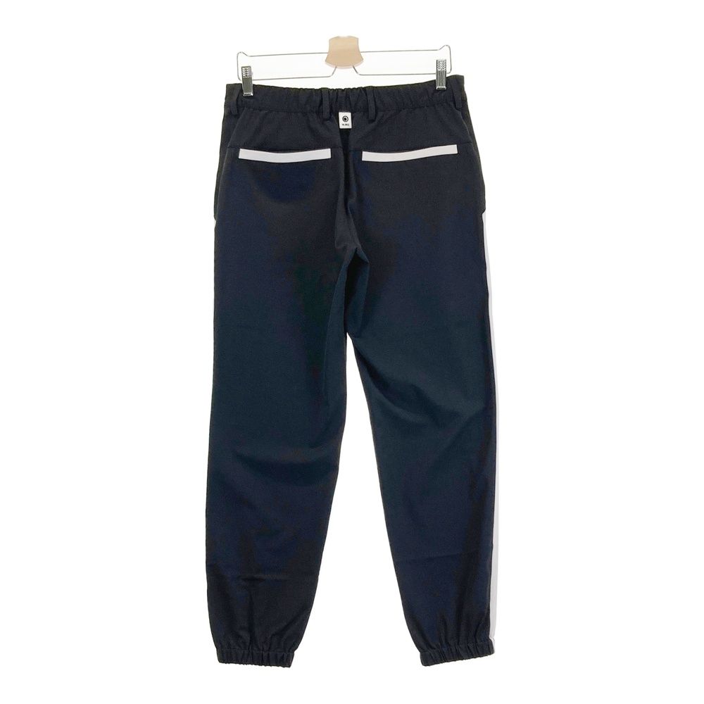 サイズ：M WJKG ダヴルジェイケイジー WOVEN PANTS イージーパンツ  ブラック系 [240101485392] ゴルフウェア メンズ ストスト サイズ：M WJKG ダヴルジェイケイジー WOVEN PANTS イージー