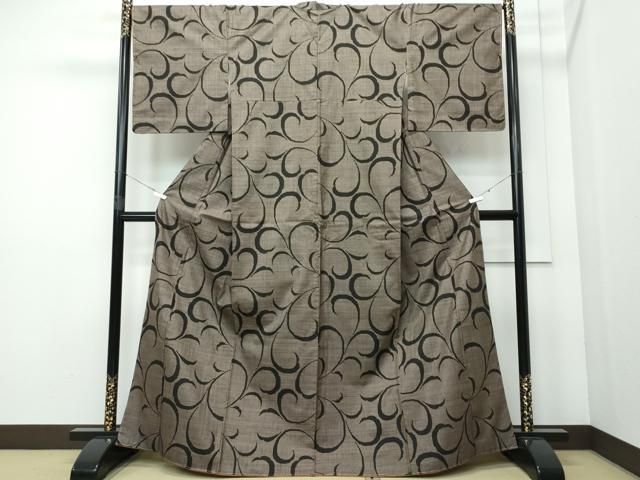 平和屋着物○本場大島紬 7マルキ 泥染め 唐草文 正絹 逸品 未使用  