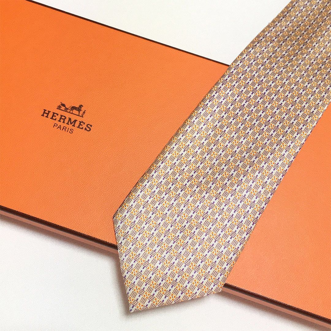 美品 エルメス HERMES ネクタイ シルク100% オレンジ / パープル 総柄