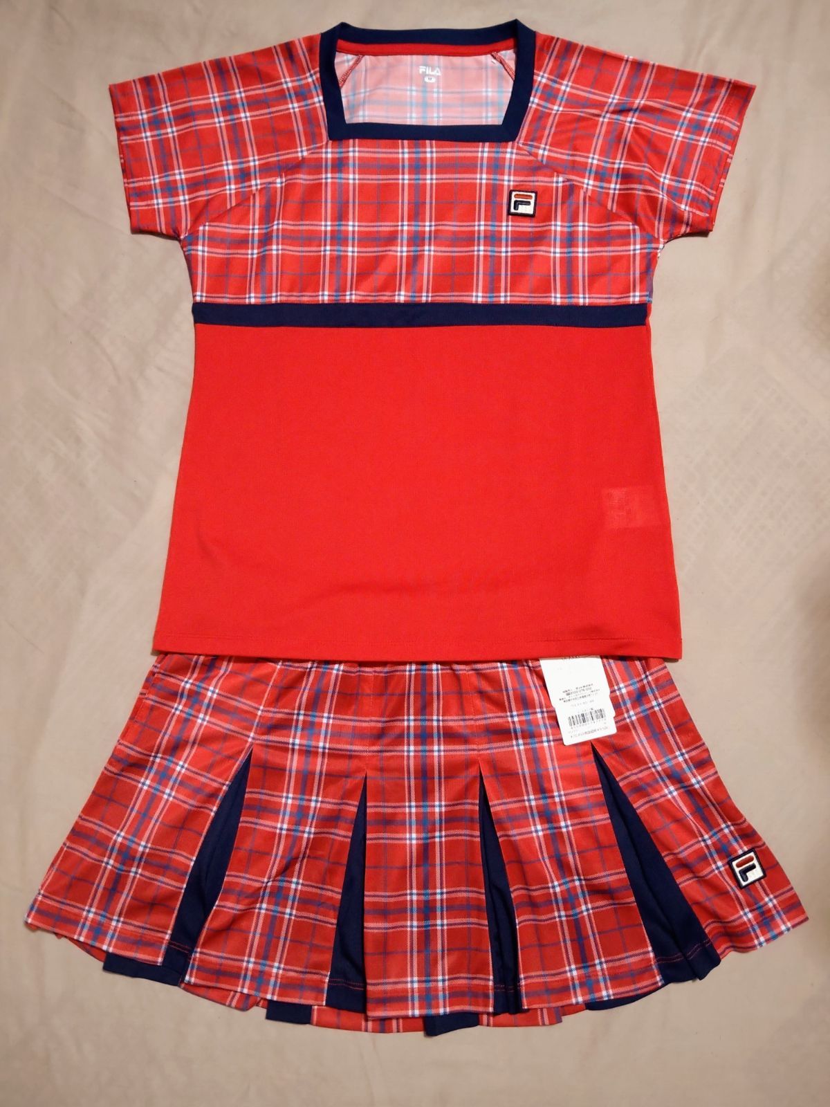 メルカリShops - FILA フィラ テニスウェア ゲームシャツ Mサイズ 赤 チェック柄 美品