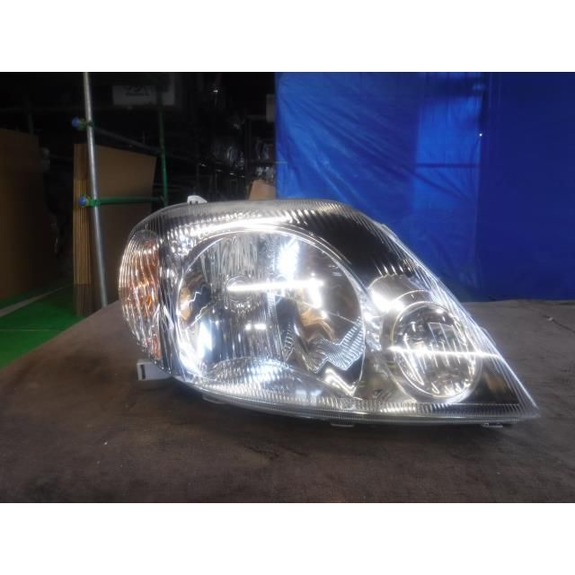 カローラフィールダー UA-NZE124G 右ヘッドランプ