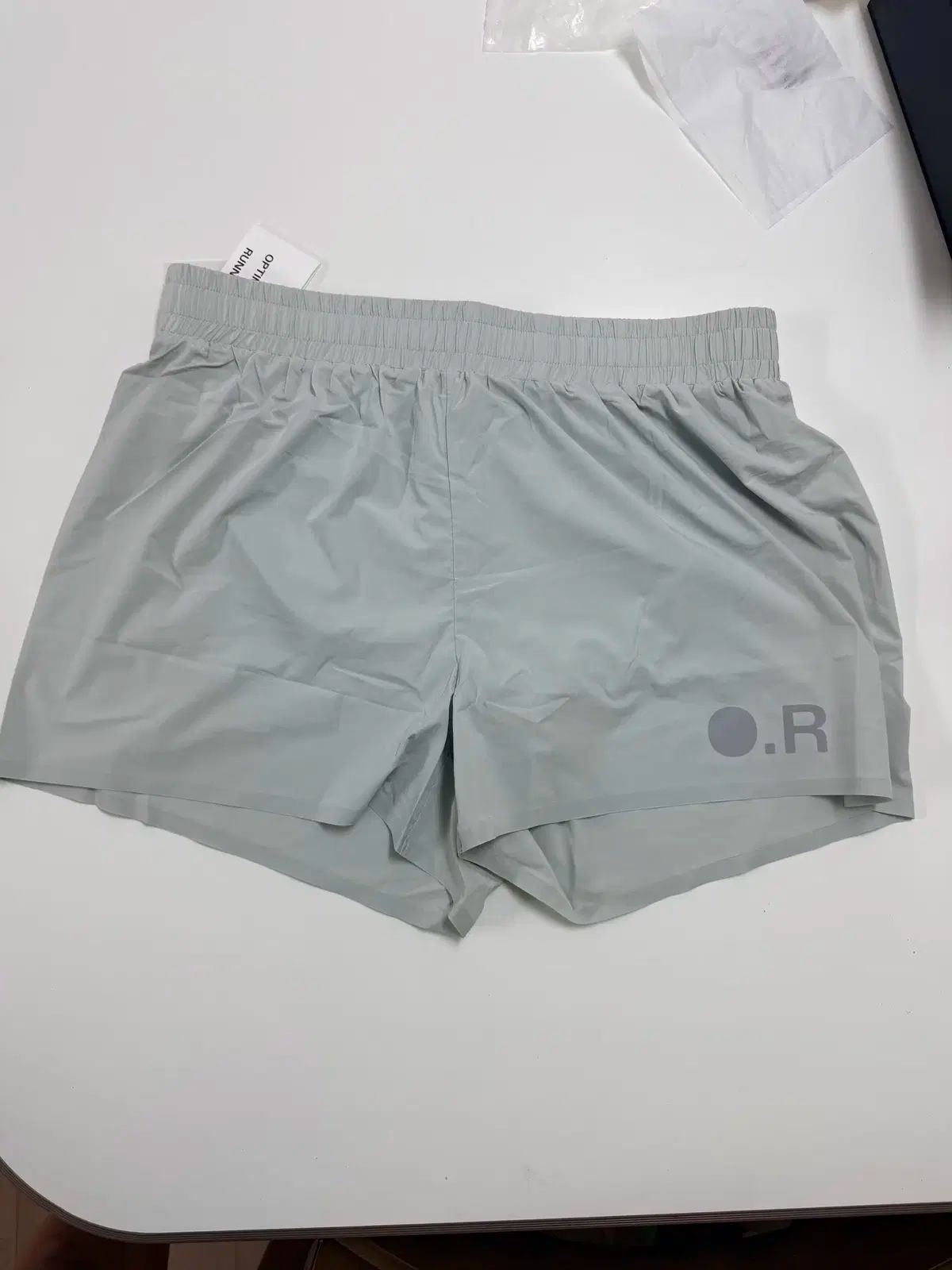オプティミスティック ランナーズ OR マット ショーツ グレー L