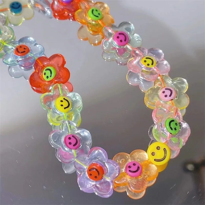 レトロなフラワーニコちゃんスマホストラップ♡ - メルカリ