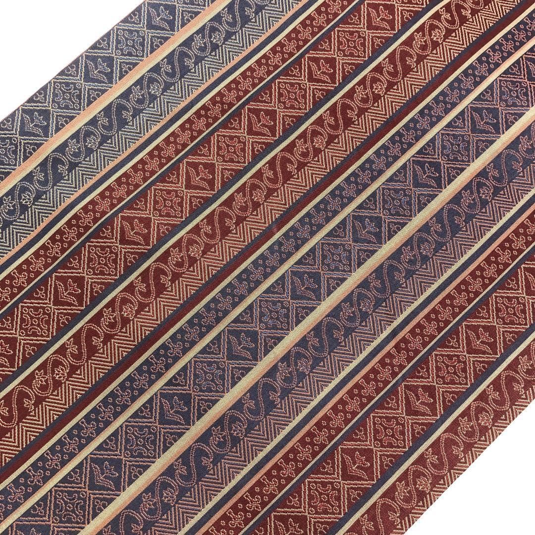 名古屋帯 縦縞花唐草模様 深蘇芳色 O-5486