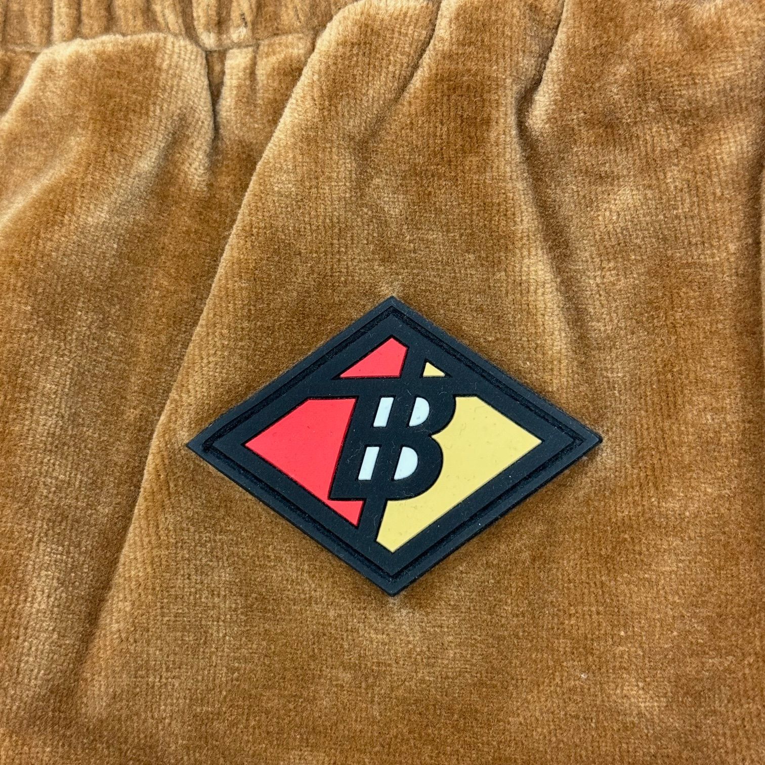 国内正規 BURBERRY グラフィックベロアトラックパンツ イージーパンツ 