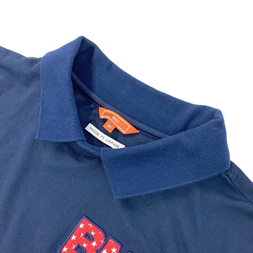 サイズ：M BEAMS GOLF ビームスゴルフ  襟付き 半袖Tシャツ  ネイビー系 [240101449299] ゴルフウェア レディース ストスト サイズ：M BEAMS GOLF ビームスゴルフ 襟付き 半袖Tシャツ