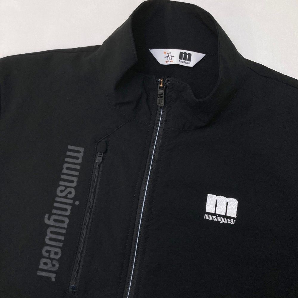 サイズ：M MUNSING WEAR マンシングウェア  ジップ ナイロンジャケット  ブラック系 [240101430581] ゴルフウェア レディース ストスト Penguin by Munsingwear 公式 ペンギン バイ マンシングウェア