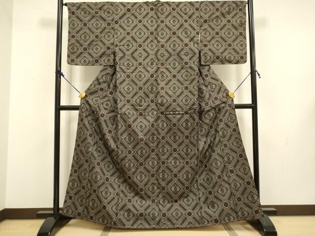 平和屋着物○本場大島紬 龍郷絣 花菱文 正絹 逸品 未使用 DAAV8660tw