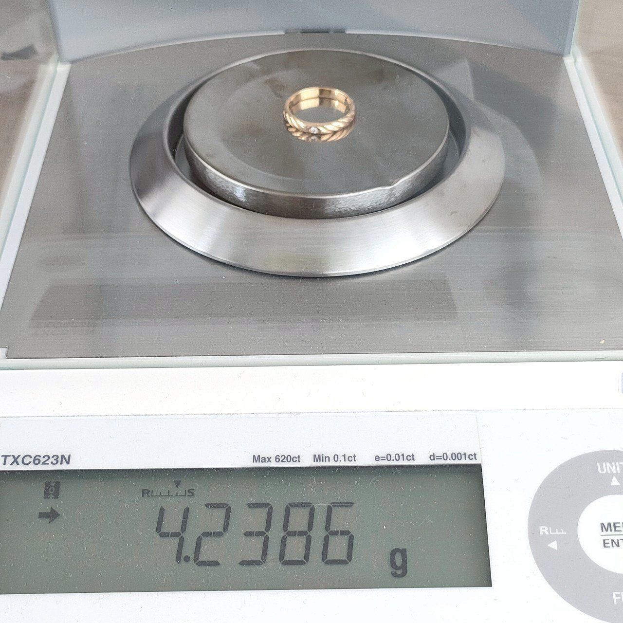 4.23g