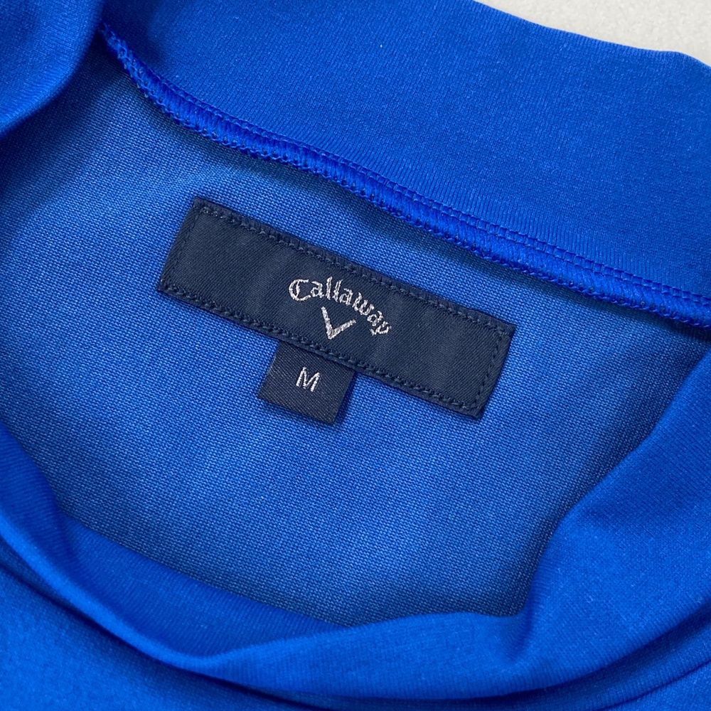 サイズ：M CALLAWAY キャロウェイ 2025年モデル ハイネック半袖Tシャツ  ブルー系 [240101502493] ゴルフウェア メンズ ストスト サイズ：M CALLAWAY キャロウェイ 2025年モデル ハイネック半袖T