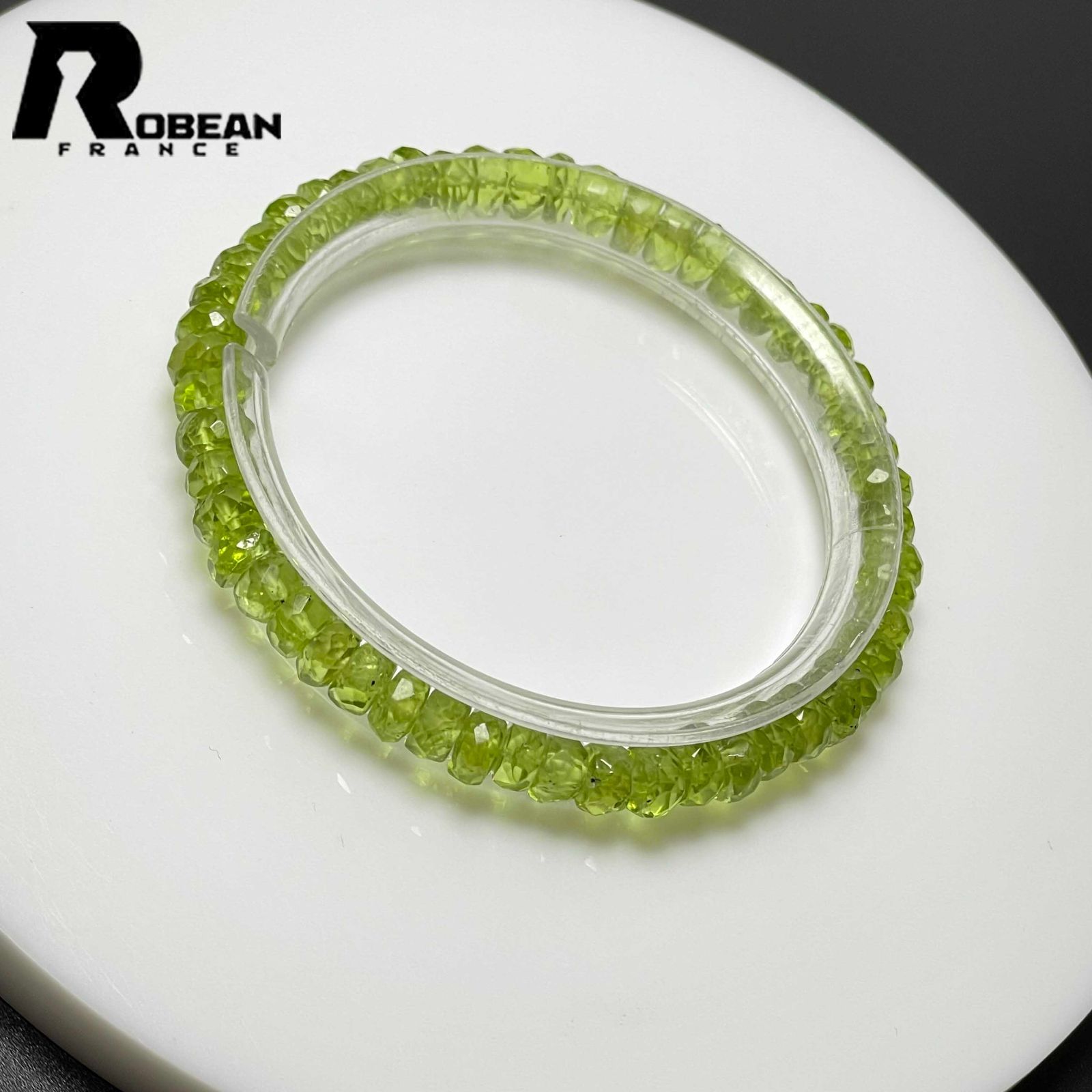絶賛 EU製 定価8万円ROBEAN・グリーンペリドットボタンカット 