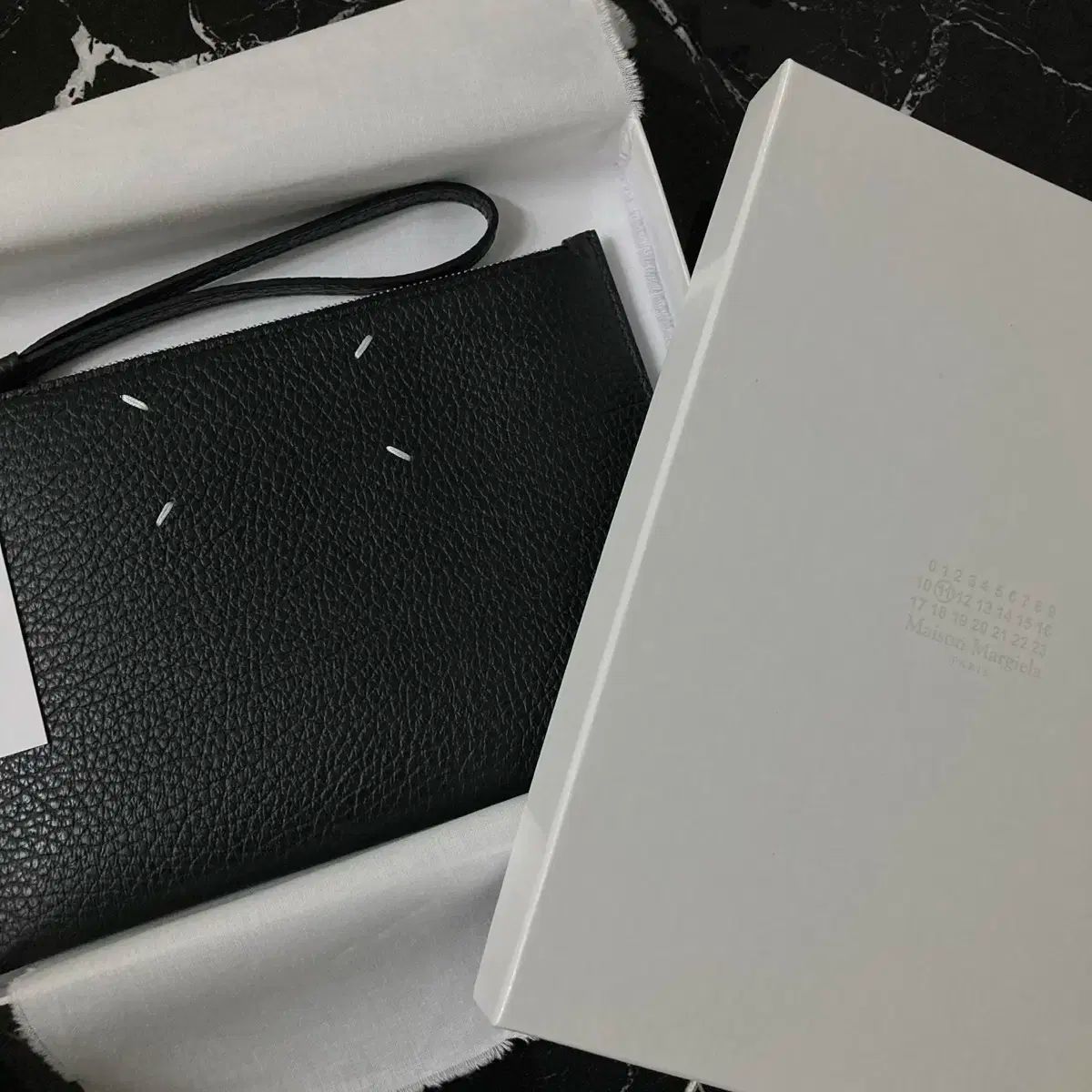 Maison Margiela(メゾン マルジェラ) クラッチ 出品 - メルカリ
