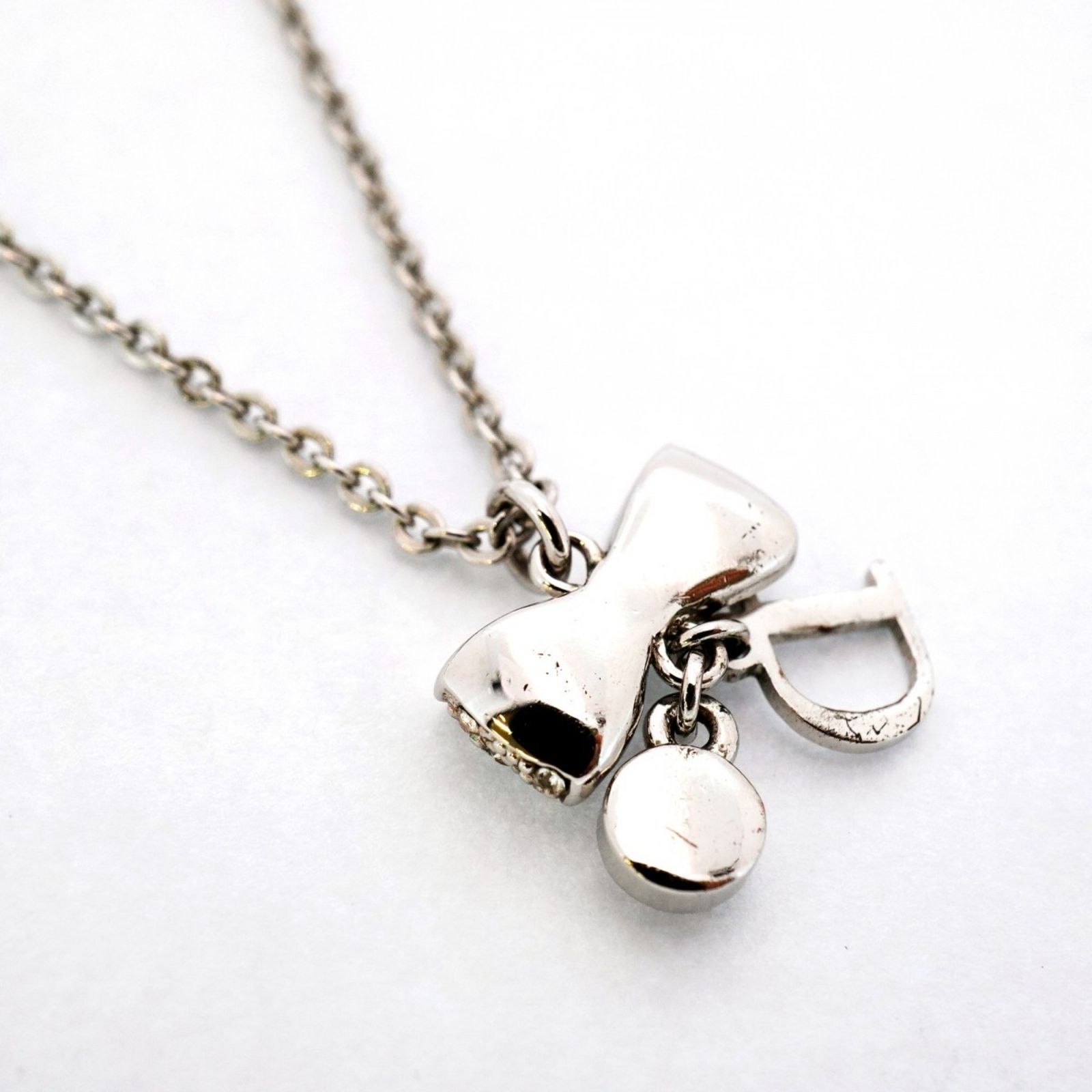 ディオールシルバー ピンク リボン ネックレスクリスチャンディオール