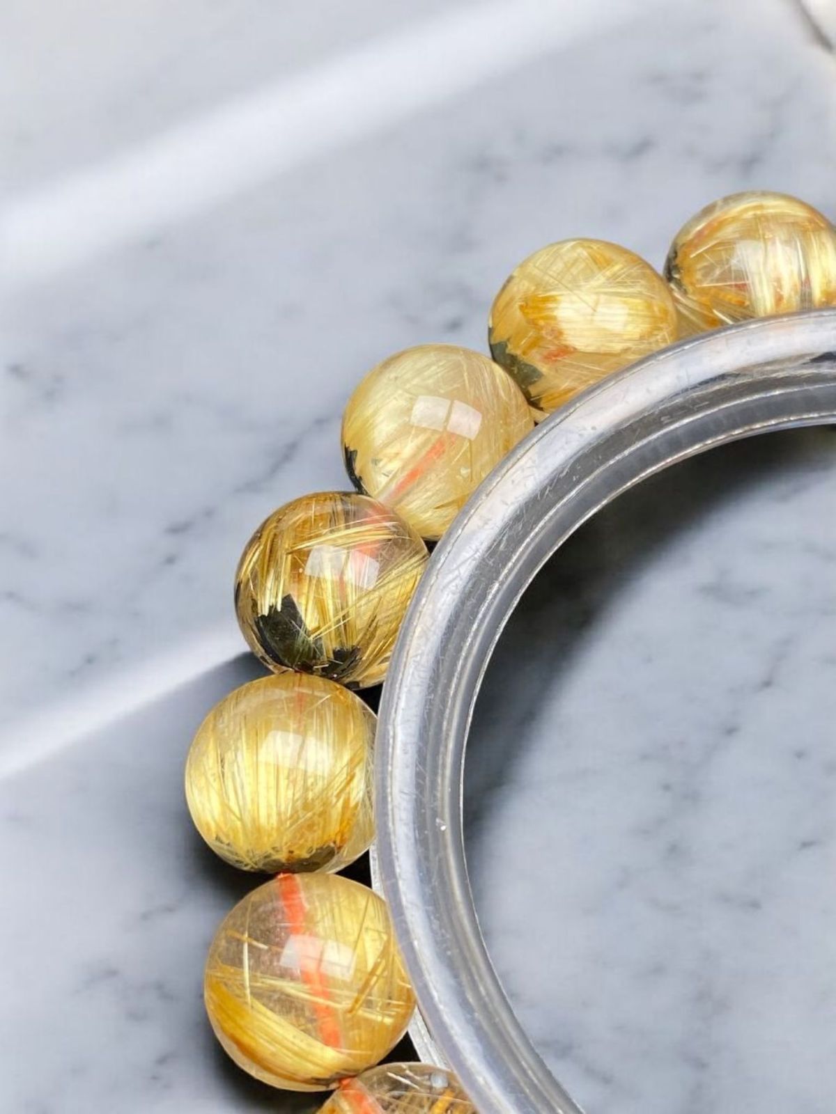 キャッツアイ太陽放射タイチンルチル[zDK7m20]極品位 9mm - メルカリ 