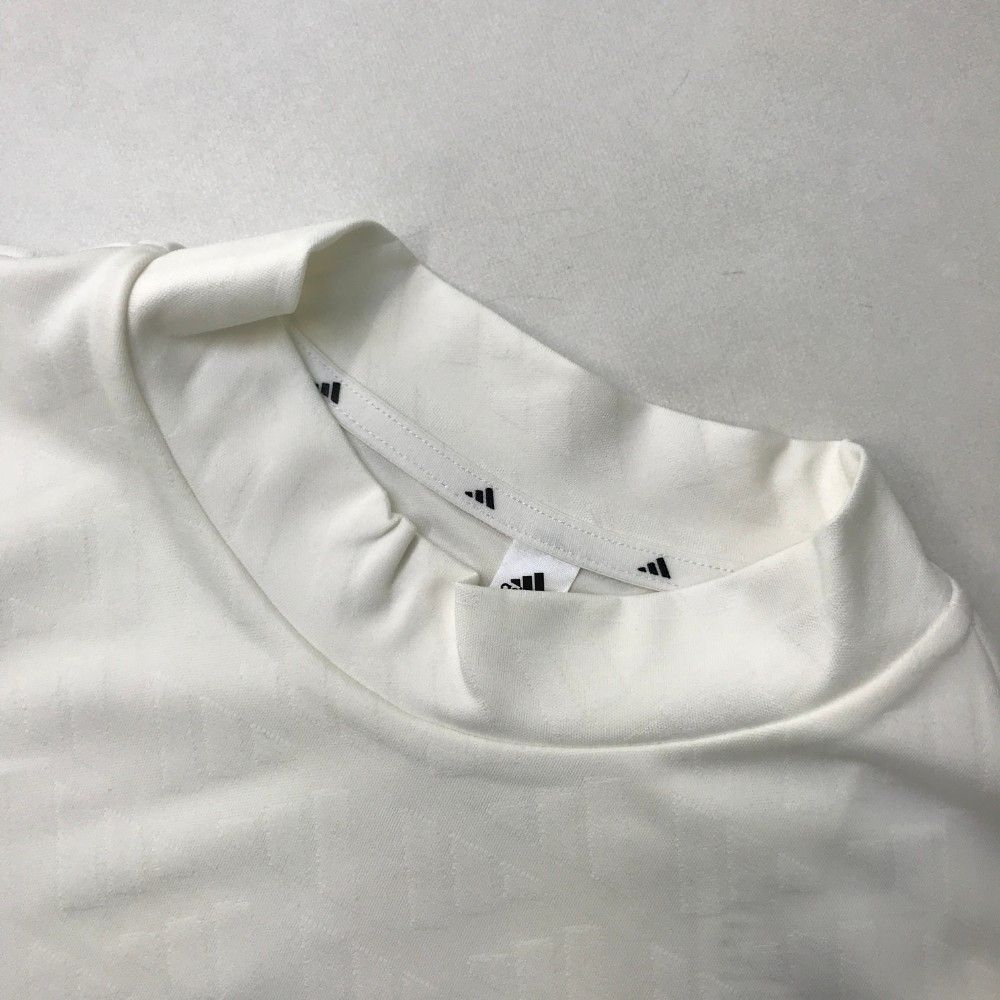 サイズ：2XL ADIDAS GOLF アディダスゴルフ IN9059 2024年モデル ハイネック 半袖Tシャツ ロゴ 総柄 ホワイト系 [240101456156] ゴルフウェア メンズ ストスト サイズ：2XL ADIDAS GOLF アディダスゴルフ IN9059 2024年モデル