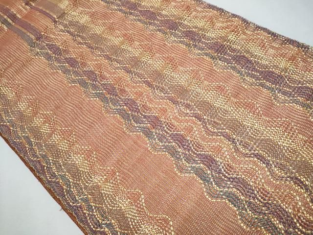 平和屋着物○ひなや工房 くむ・あむ・おる 伊豆蔵明彦 太鼓柄袋帯