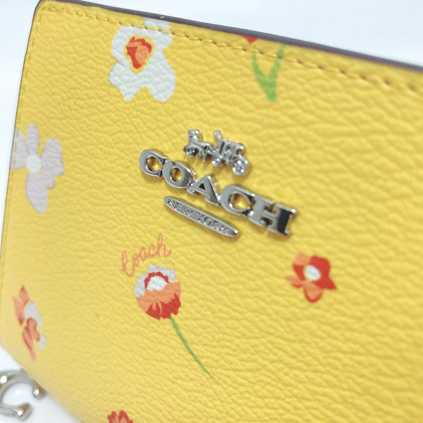 人気特価 コーチCOACH 折りたたみ財布 イエロー 花柄 フローラル C8703