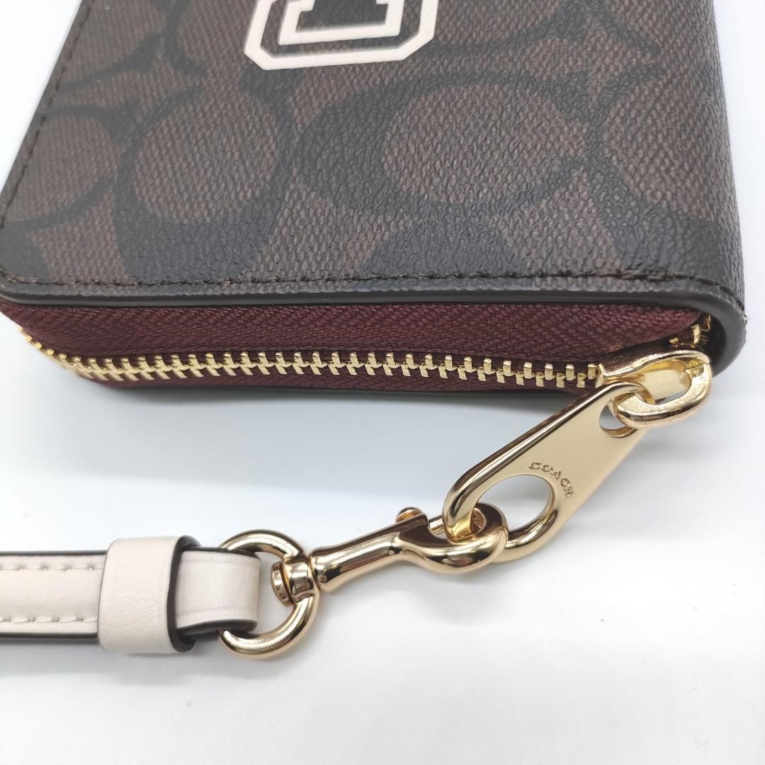COACH] コーチ シグネチャー柄 ラウンドジップ長財布 CB856（ブラウン