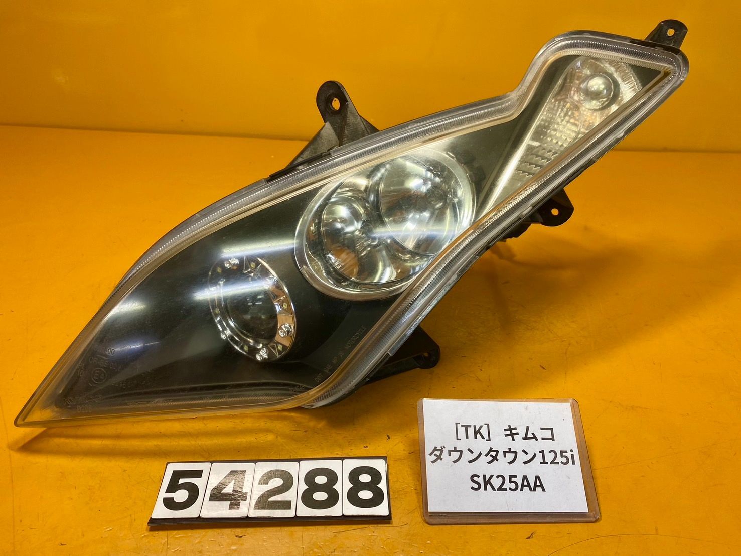 【送料無料】[TK 54288]キムコ ダウンタウン125i SK25AA ヘッドライト　左