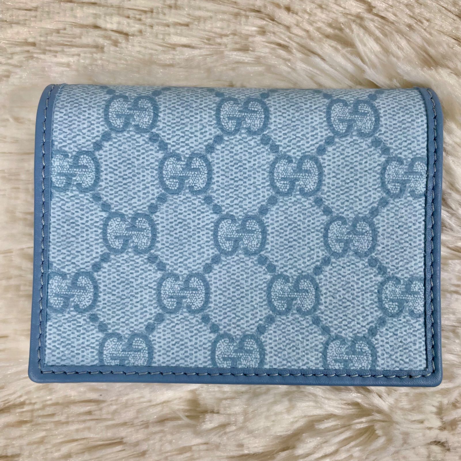 GUCCIGGエンブレム ミニウォレットブルー GG Emblem small wallet in light blue coated fabric | GUCCI® US