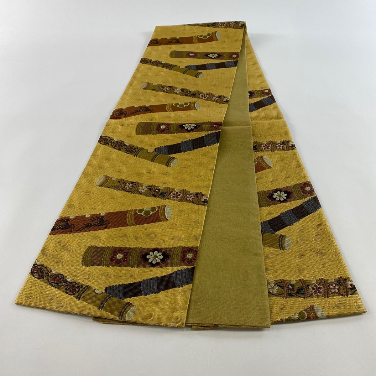 袋帯 美品 秀品 笛 草花 金糸 箔 茶色 六通 正絹 【中古】