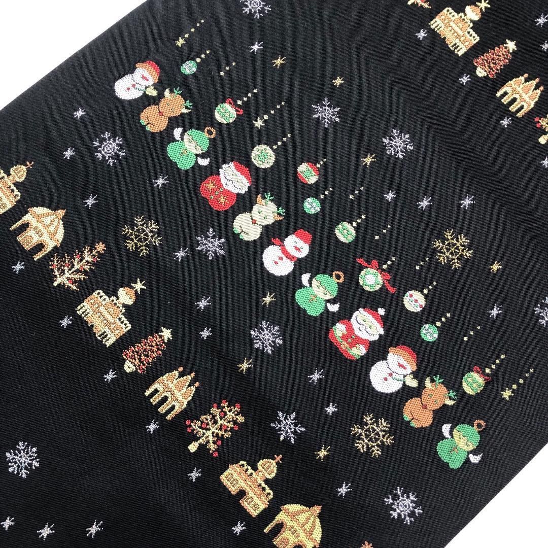 名古屋帯 西陣大光 証紙付 クリスマス サンタ トナカイ 黒色 O-5644
