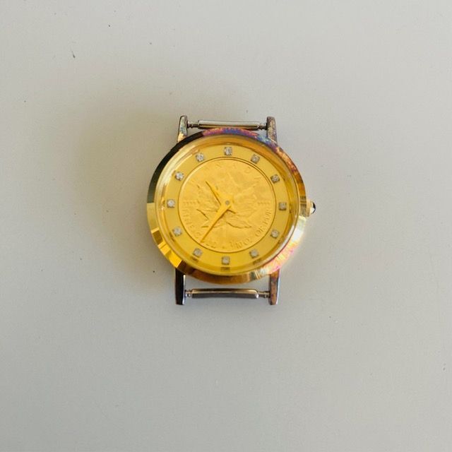 腕時計 24金メイプルリーフ 金貨時計 ヒルトン - メルカリ