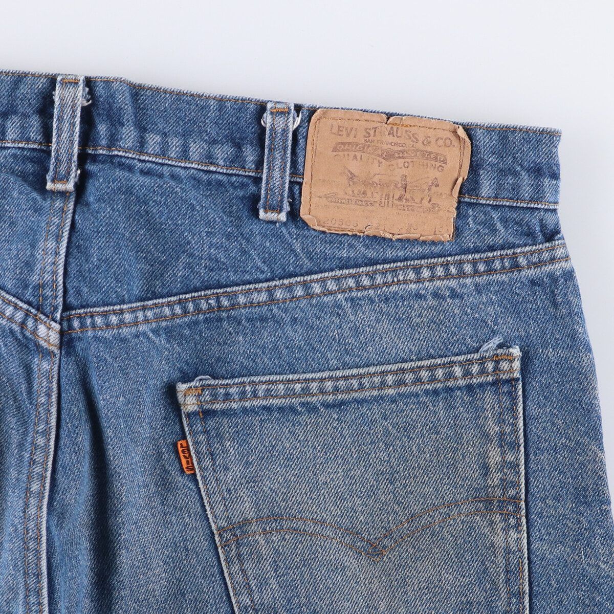 テーパードデニムパンツ