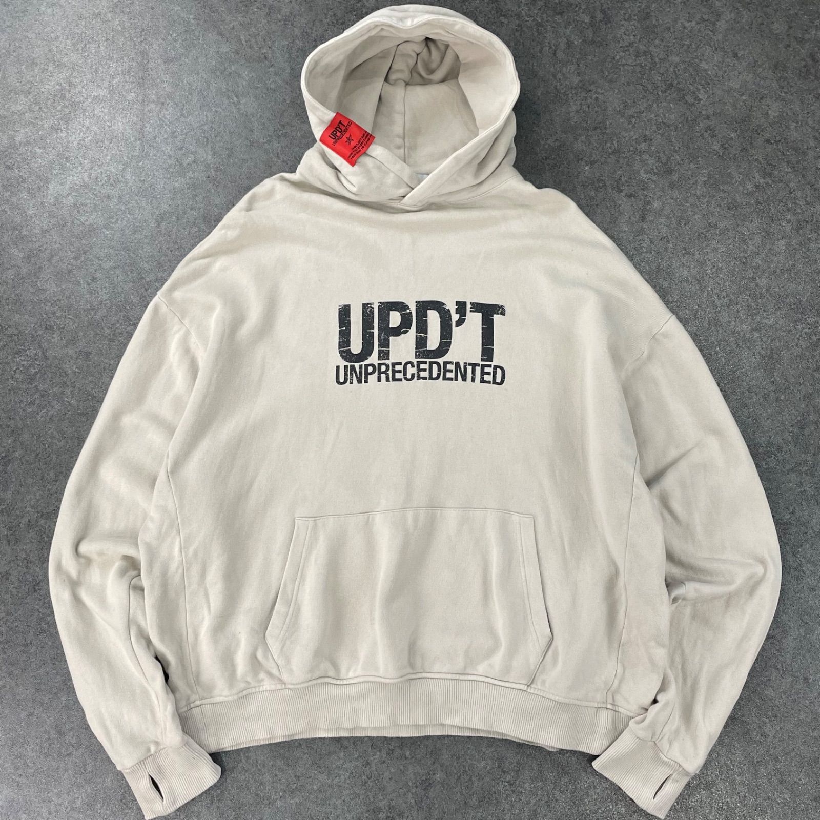 UPD'T UNPRECEDENTED アンプレサデンティド スウェット パーカー