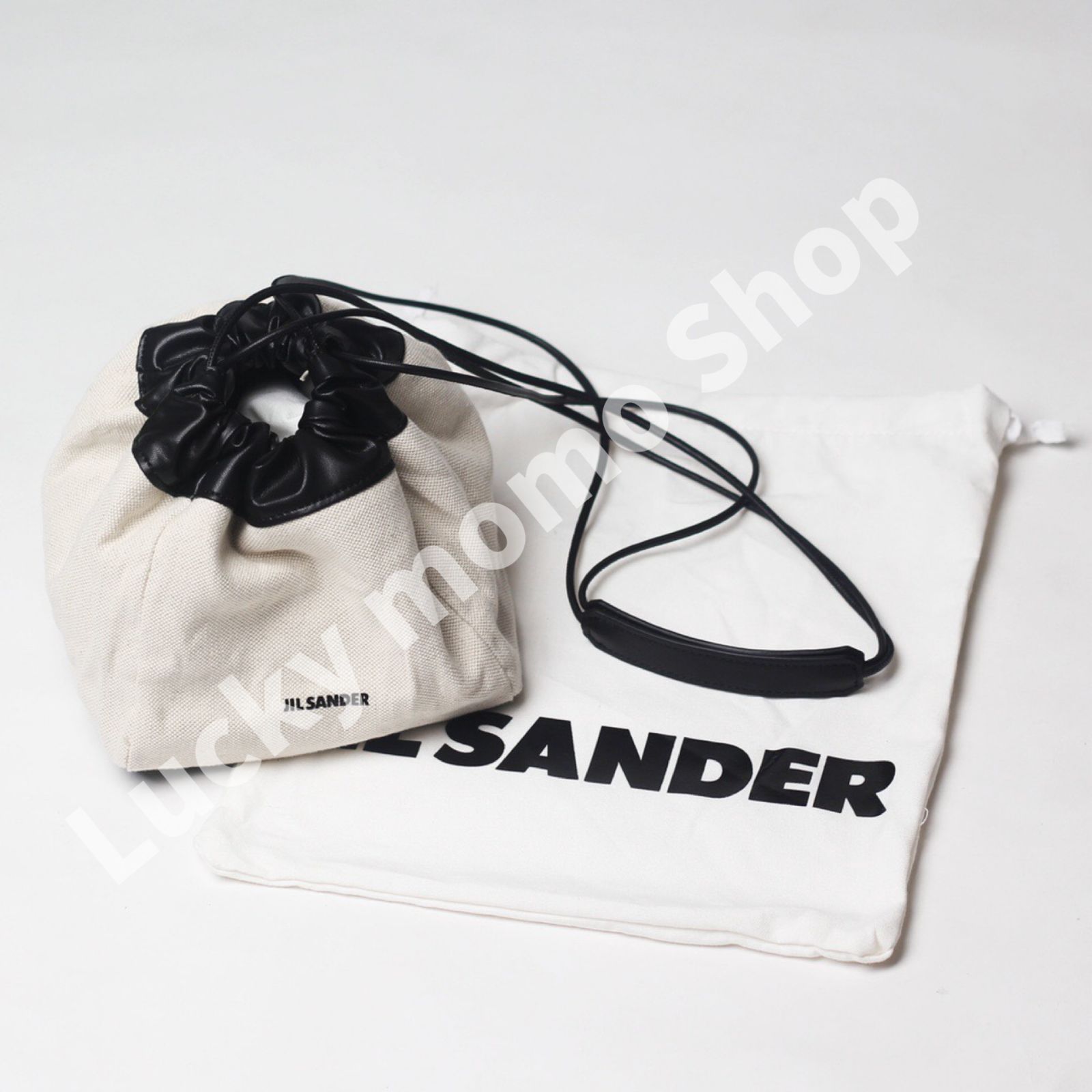 大人気 新品 JIL SANDER DRAWSTRING CROSSBODY BAG ジルサンダー ファッション レディース バッグ スモール ショルダーバッグ ドローストリングバッグ 斜め掛けショルダーバッグ ナチュラル×ブラック 2way